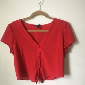 red cropped blouse